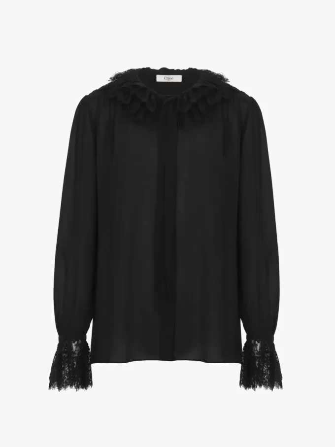 Böljande blus i sidengeorgette och spets Böljande blus i sidengeorgette och spets