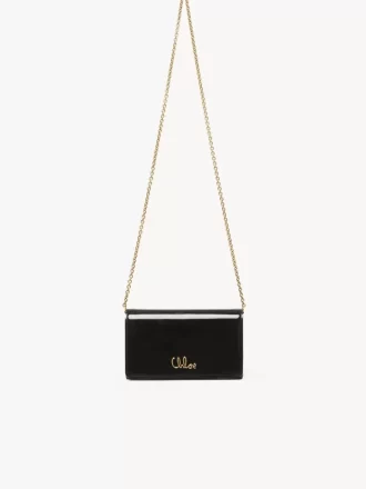 Chloé Iconic plånbok med lock och kedja i lackskinn Chloé Iconic plånbok med lock och kedja i lackskinn