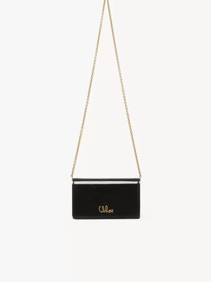 Chloé Iconic plånbok med lock och kedja i lackskinn Chloé Iconic plånbok med lock och kedja i lackskinn