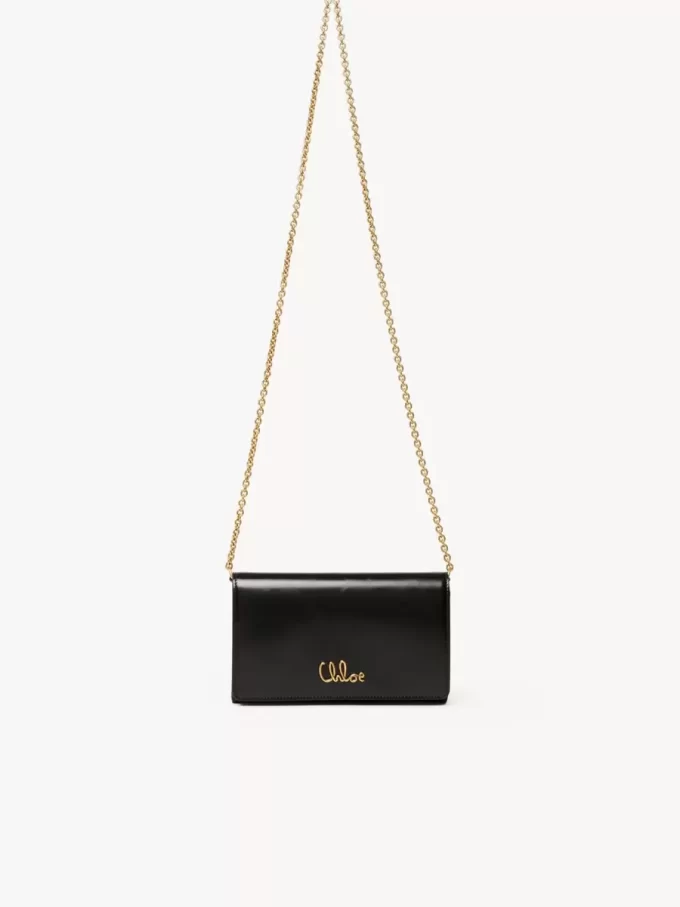 Chloé ikonisk plånbok med lock och kedja i glansigt läder Chloé ikonisk plånbok med lock och kedja i glansigt läder