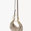 Liten hoboväska med armband i narvat läder Liten hoboväska med armband i narvat läder
