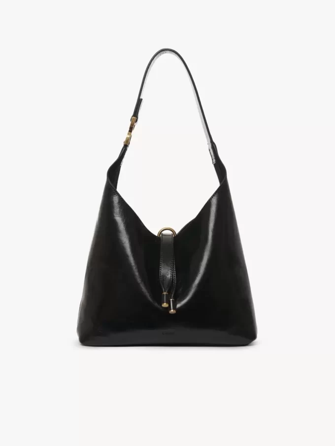 Liten Marcie hobo-väska i glansigt läder Liten Marcie hobo-väska i glansigt läder