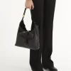 Liten Marcie hobo-väska i glansigt läder Liten Marcie hobo-väska i glansigt läder