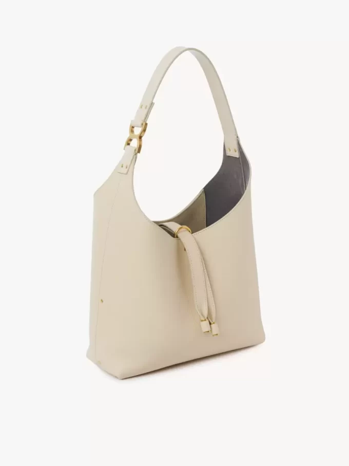 Liten Marcie hobo-väska i narvat läder Liten Marcie hobo-väska i narvat läder