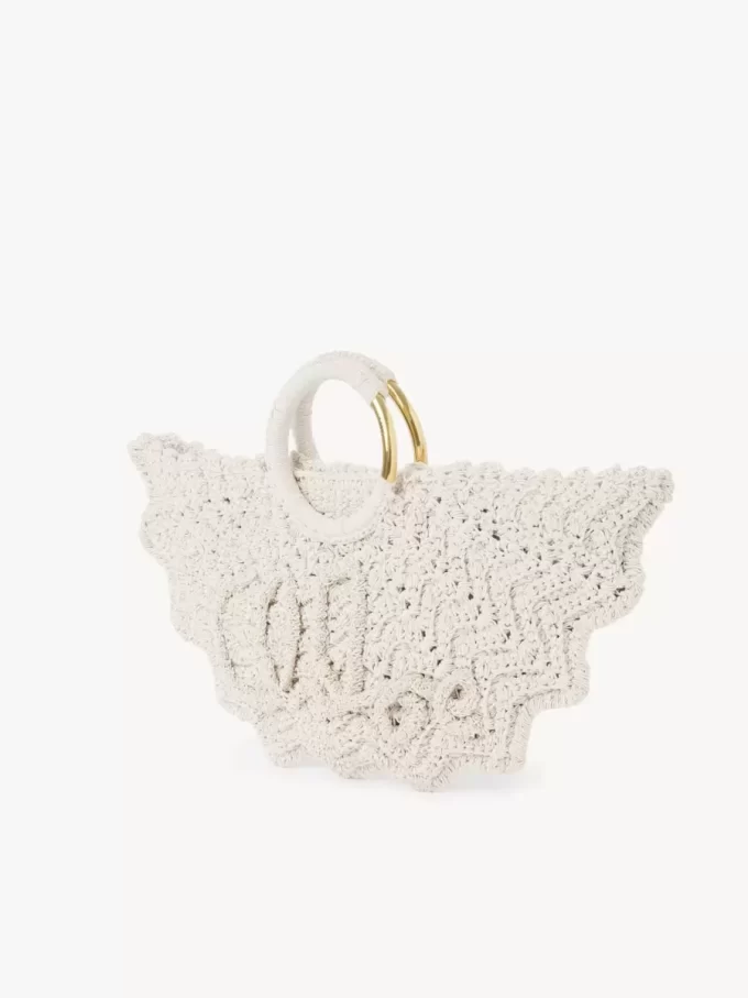 Liten virkad tote-väska med armband, Paravent Liten virkad tote-väska med armband, Paravent