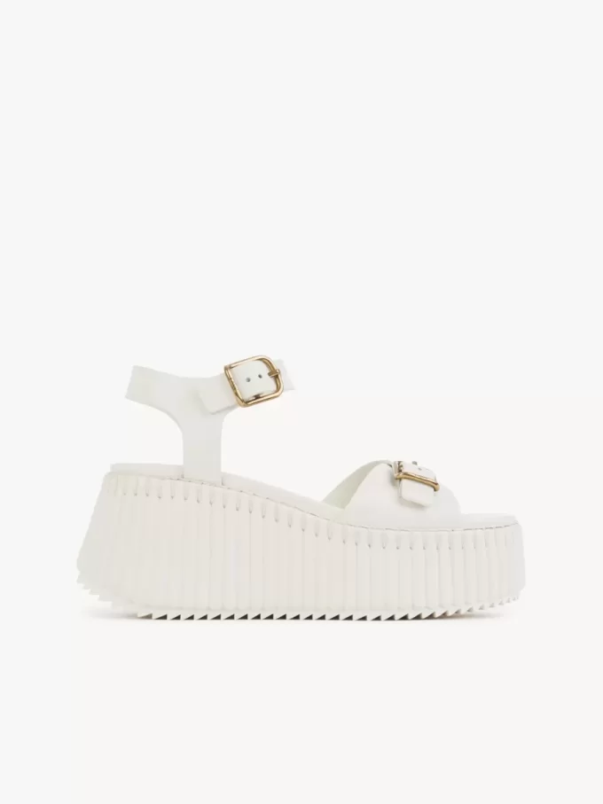 Nama kilklackade sandaler Nama kilklackade sandaler