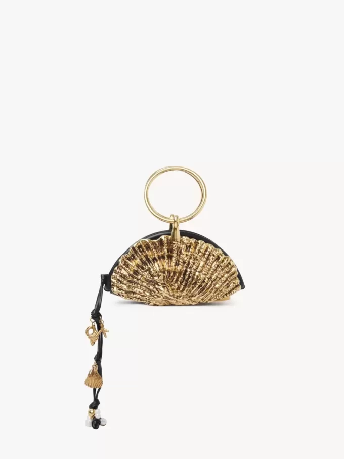 Sea Treasures kuvertväska med skal och dragkedja i mjukt läder och metall Sea Treasures kuvertväska med skal och dragkedja i mjukt läder och metall