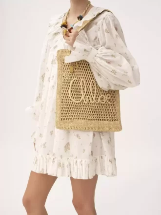 Sommarväska med bananmotiv i raffia Sommarväska med bananmotiv i raffia