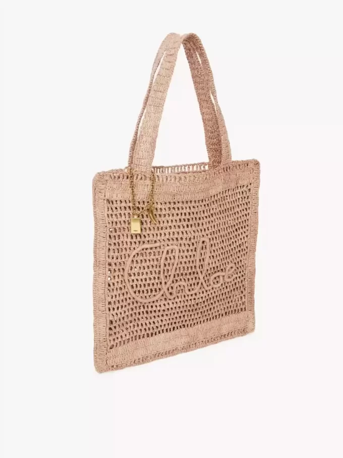 Sommarväska med bananmotiv i raffia Sommarväska med bananmotiv i raffia