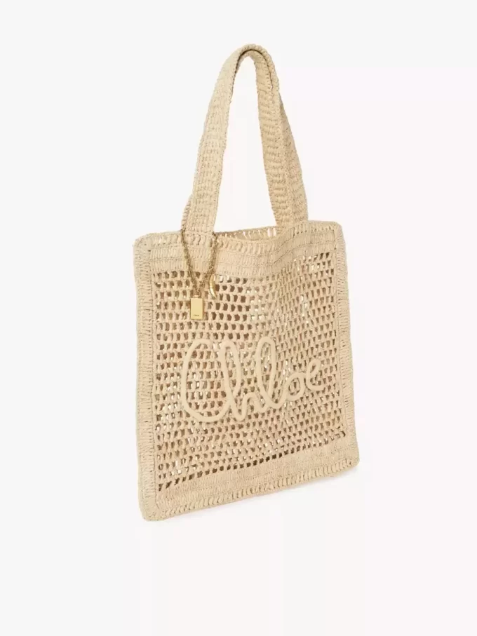 Sommarväska med bananmotiv i raffia Sommarväska med bananmotiv i raffia