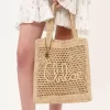 Sommarväska med bananmotiv i raffia Sommarväska med bananmotiv i raffia