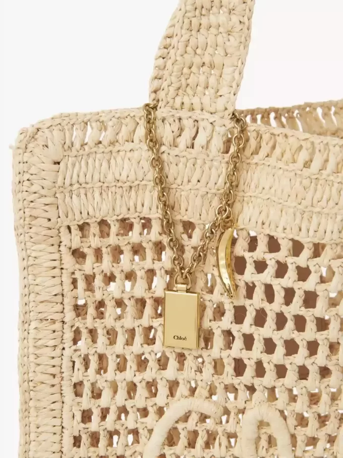 Sommarväska med bananmotiv i raffia Sommarväska med bananmotiv i raffia