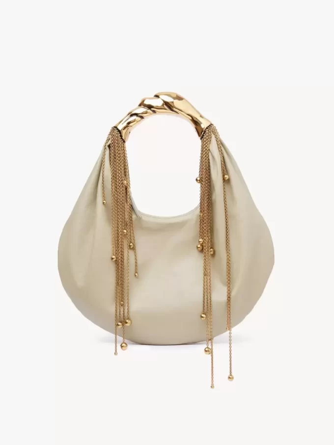 Twisted Shell hobo-väska i glansigt läder Twisted Shell hobo-väska i glansigt läder