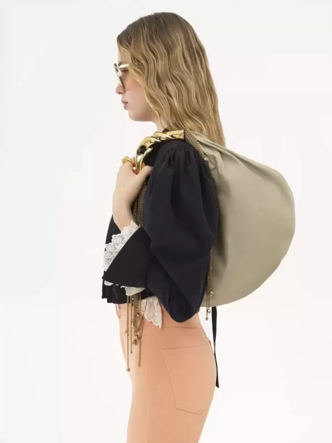 Twisted Shell hobo-väska i glansigt läder Twisted Shell hobo-väska i glansigt läder