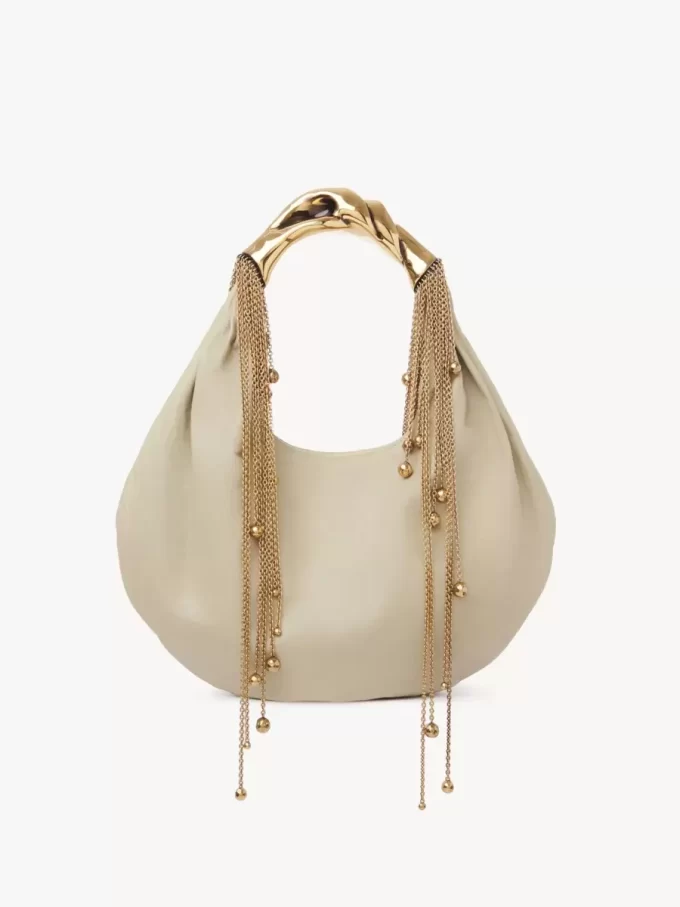 Twisted Shell hobo-väska i glansigt läder Twisted Shell hobo-väska i glansigt läder