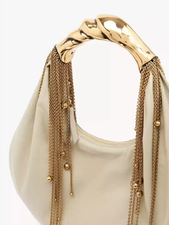 Twisted Shell hobo-väska i glansigt läder Twisted Shell hobo-väska i glansigt läder